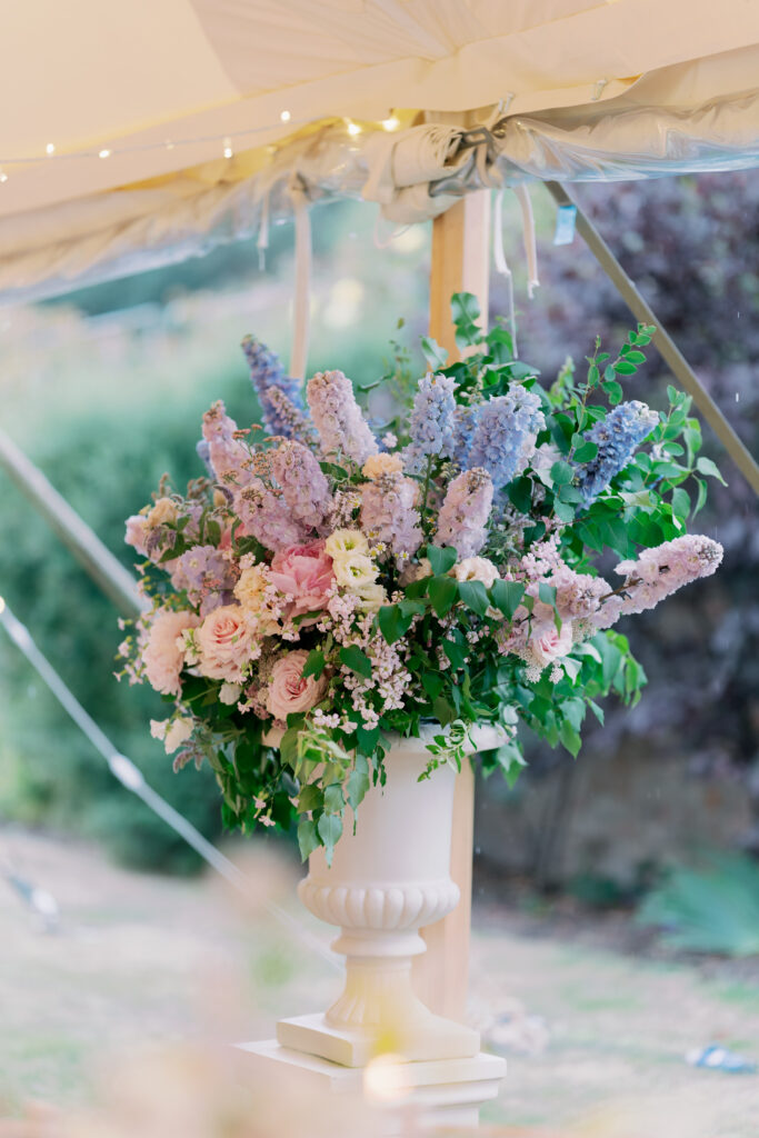 Wedding reception table setting with candles and flowers, timeless wedding details