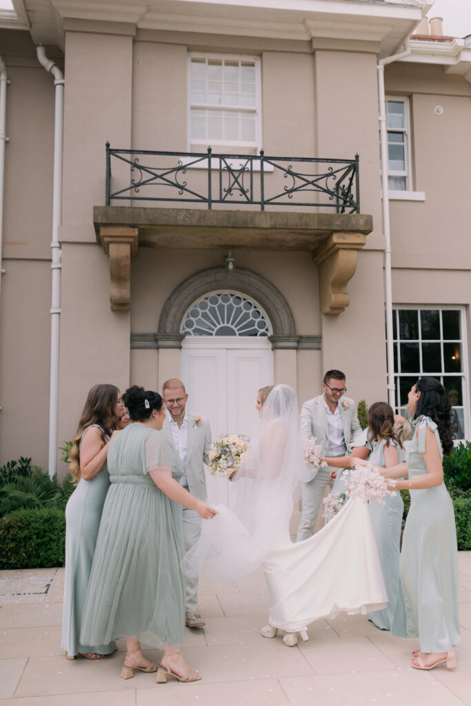 Wedding guests celebrating at Burtonfields Hall reception