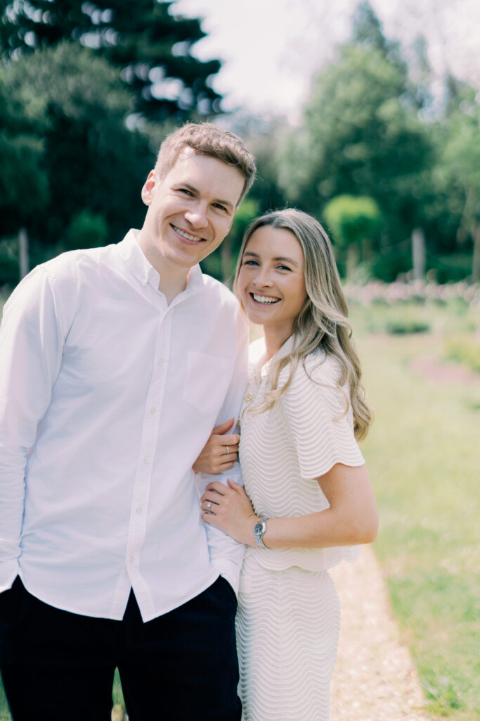 Couple smiling at camera at Chiswick House Gardens