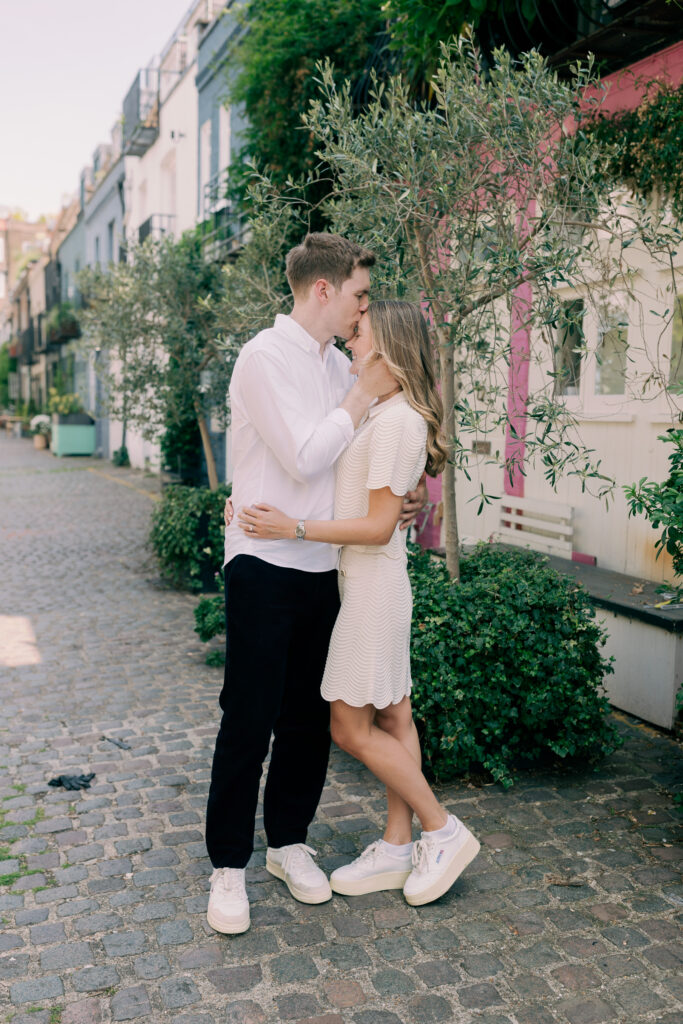 Fine art engagement session couple embracing in picturesque Notting Hill mews