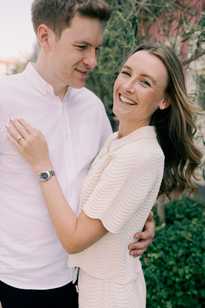 Joyful bride laughing during engagement session in charming Notting Hill mews London