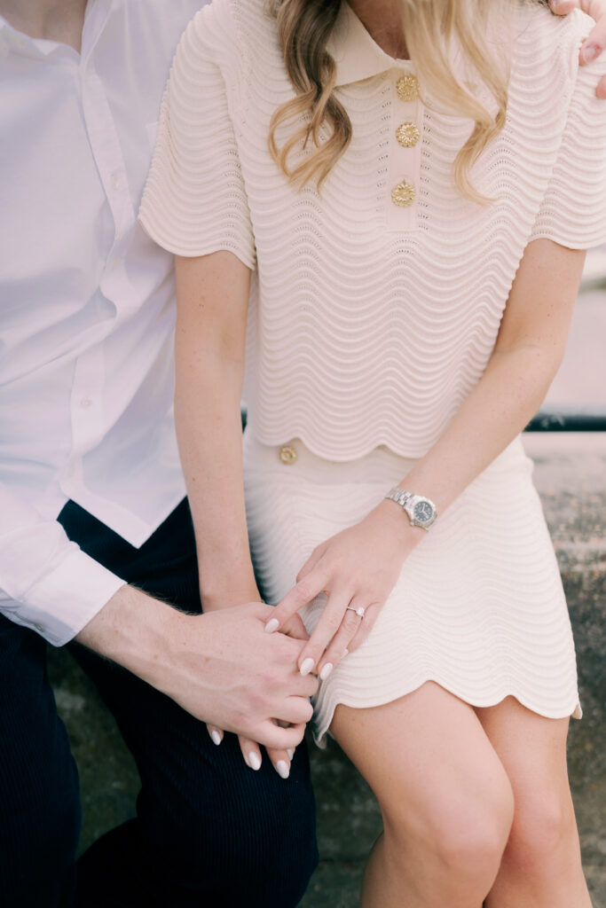 Natural moment captured during waterfront stroll Chiswick London engagement photography