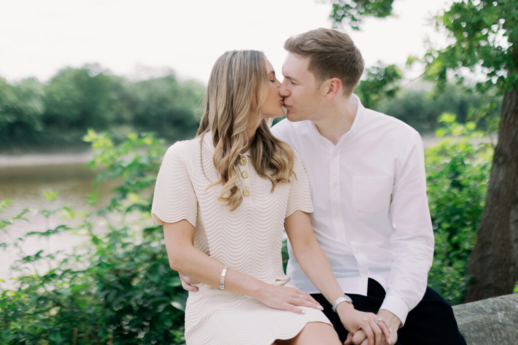 Couple captured during waterfront stroll Chiswick London engagement photography