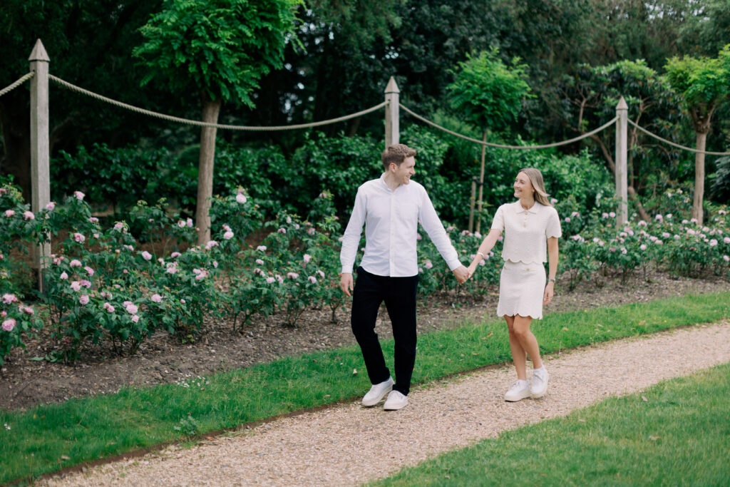 Timeless engagement portraits by classical statues Chiswick House grounds London