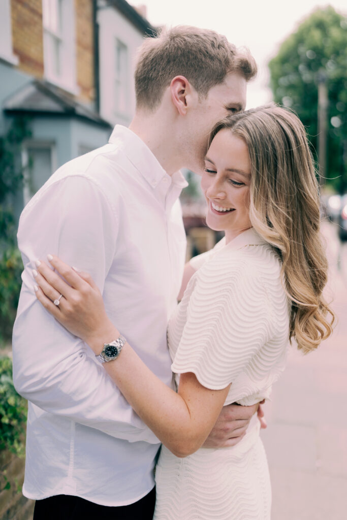 Couple embracing in their London pre-wedding shoot.