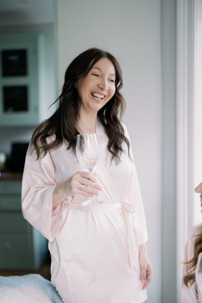 Soft morning light illuminating bride's preparation for London spring wedding