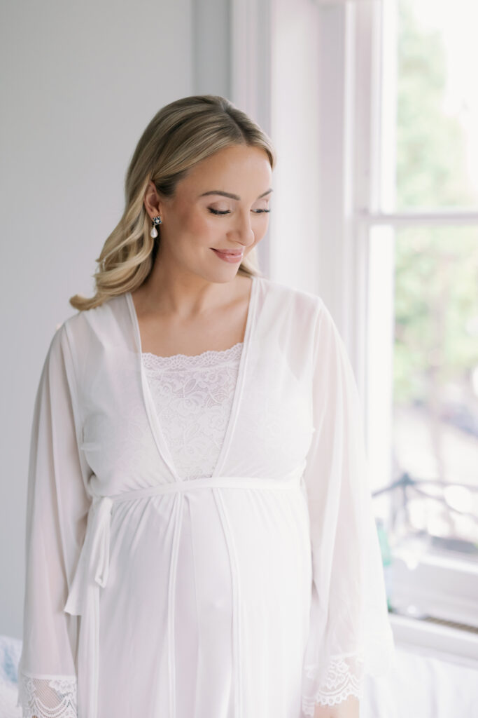 Soft morning light illuminating bride's preparation for London spring wedding
