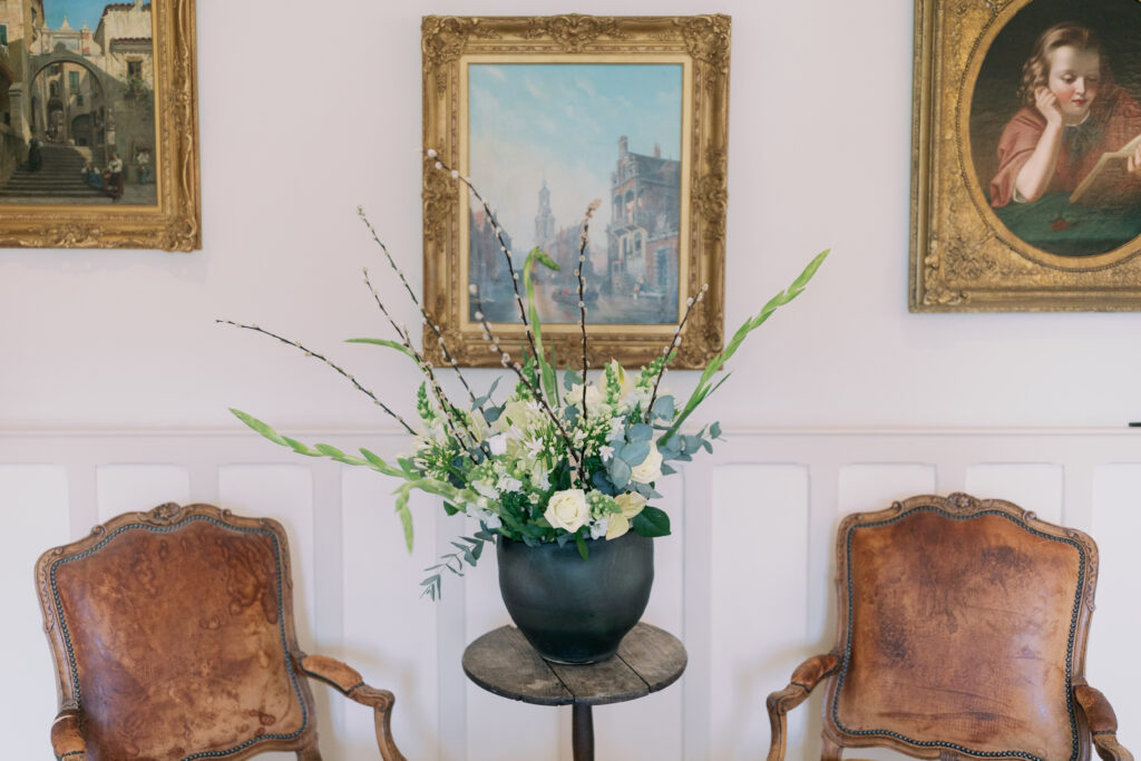 Elegant master bedroom at Casterton Grange with four-poster bed and romantic lighting